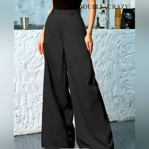 NWOT, gorgeous and never worn black, wide legged trousers!